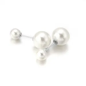 Faux pearl brooch pin DIY jewelry accessory detail, elegant off-white double pearl design.