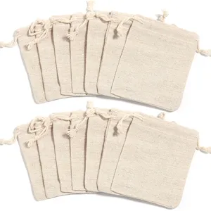 Durable cotton linen drawstring pouches set, natural burlap gift bags for jewelry packaging.