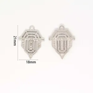 Detailed view of silver rhinestone shield charm pendant, perfect for DIY jewelry crafting necklace.