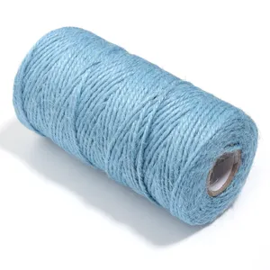 Blue jute twine roll detail view for DIY crafts gift wrapping and clothing tag strings.