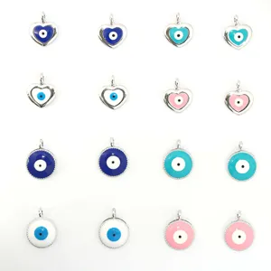 Close-up details of Turkish evil eye charms, showing vibrant enamel colors and silver alloy links.