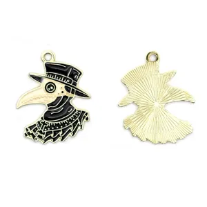 Detailed close-up of plague doctor enamel pendant, showing exquisite black and gold metal craft.