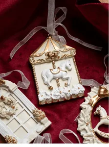 Nordic style white and gold resin carousel horse Christmas tree hanging ornament detail.