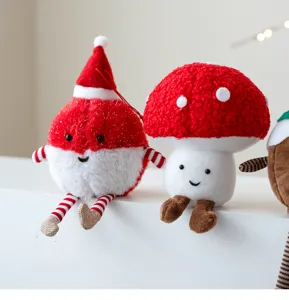 Simpatici peluche di Natale, morbidi giocattoli a forma di fungo e Babbo Natale per le feste.