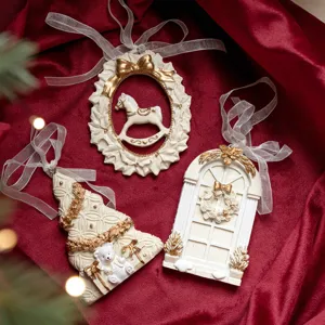 Exquisite white and gold Christmas resin hanging pendants set, perfect for holiday tree decoration.