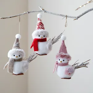 Christmas tree hanging decorations, cute fluffy foam birds with knitted hats and scarves.