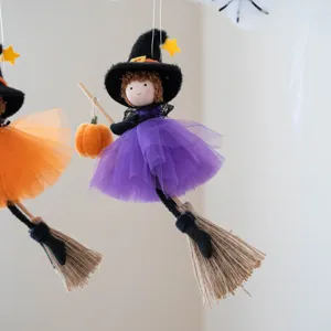 Halloween hanging witch doll decoration with tulle skirt broom and pumpkin party decor.