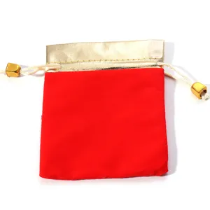 Red velvet jewelry pouch with gold top edge drawstring bag for small gifts and accessories.