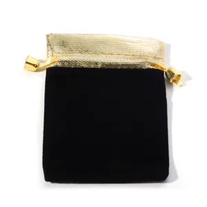 Black velvet pouch with gold metallic trim and drawstring, perfect for jewelry gift packaging.