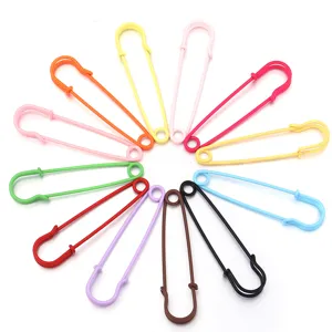 Colorful large safety pins detail view for DIY handmade jewelry and clothing accessories.