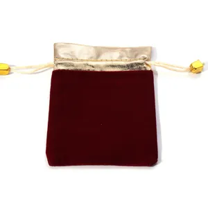 Red velvet drawstring jewelry pouch with golden top trim for gift packing and storage