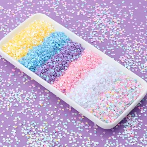 Colorful electroplated 3.0mm holeless PVC pentagram star sequins for nail art and clothing accessories.