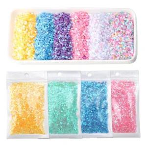 Colorful star sequins set for nail art and garment decoration, featuring mixed color trays and packs.