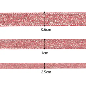 Red glitter ribbon trim detail shot, sparkling metallic fabric tape for gift wrapping DIY crafts