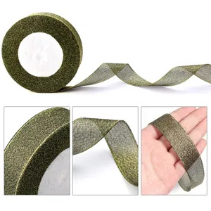 Gold glitter ribbon detail view, showing sparkling texture, smooth edge, and flexible hand feel.