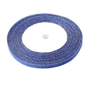 Blue glitter ribbon roll for gift wrapping, crafts, and party decoration details.