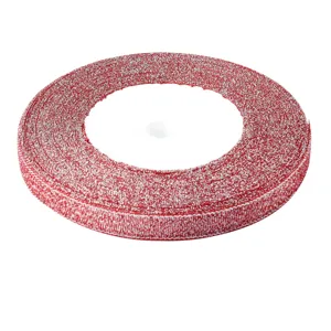 Red glitter metallic ribbon spool for gift wrapping, crafts, festive decoration and DIY bows.