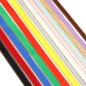 Close-up view of colorful polyester ribbons with gold edges, perfect for DIY crafts and gift wrapping.