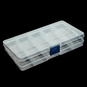 Dettaglio scatola portaoggetti in plastica trasparente a 15 scomparti per piccoli oggetti.