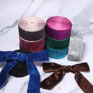 Colorful glitter velvet ribbon rolls and bows for DIY garment accessories and gift box decor.