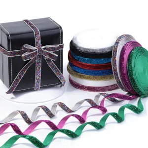 Colorful glitter elastic ribbon rolls for DIY garment sewing, gift box wrapping, and party decor.