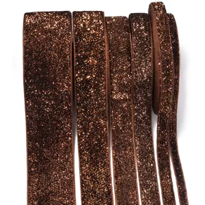 Brown glitter ribbon detail close up, shimmer craft ribbon for gift wrapping and DIY decor.