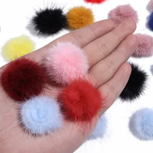 Colorful fluffy mink fur pom pom balls for keychains, DIY hair clips, and garment accessories.