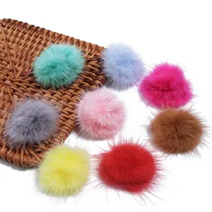 Colorful mink fur pom poms for keychains, earrings, DIY crafts, and clothing accessories.