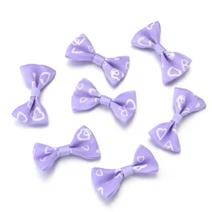Purple grosgrain ribbon bows with heart print, DIY handmade hair accessories and apparel crafts.
