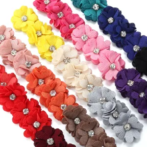 Multicolor fabric flower trims with rhinestone centers for DIY crafts and accessories.