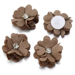 Handcrafted DIY four-petal hemp flower accessories with rhinestone core and felt backing.