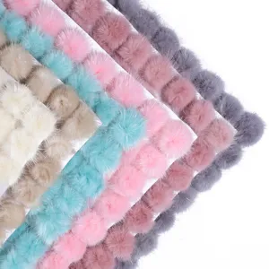 Colorful fluffy mink fur pom poms for DIY crafts keychains and cute hair accessories.