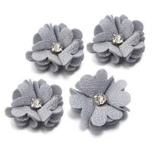 Grey fabric flower detail close up, rhinestone center diy accessory for clothes bags hats.