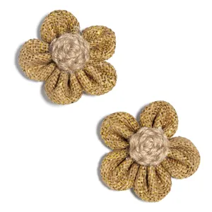 Detailed shot of handmade burlap five-petal flower DIY accessories with golden threads.
