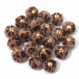 Leopard print furry ball charm with gold loop, perfect for DIY earrings, necklaces, and phone chains.