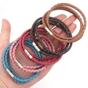 Pulseras trenzadas de cuero multicolores de triple vuelta con cierre magnético de metal.