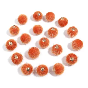 Fluffy orange pom pom charms with metal loops for earrings keychains DIY jewelry making accessories.