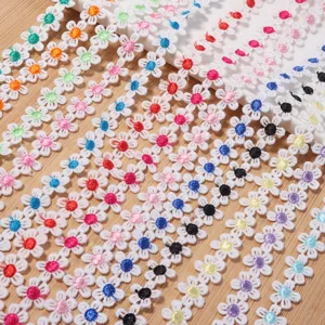 Polyester colorful water-soluble embroidered hollow small daisy lace trim for DIY crafts and clothing.