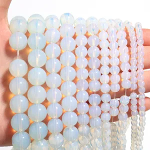 Synthetic opal round beads loose strands for DIY jewelry making, smooth and shiny white.