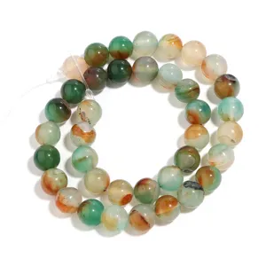Kralenstreng van kleurrijke pauw agaat edelsteen voor DIY handgemaakte armband sieraden.