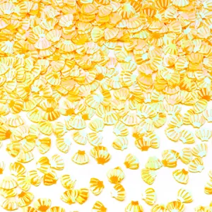 Dettaglio di paillettes conchiglia dorate, PVC senza foro per nail art e decorazioni.