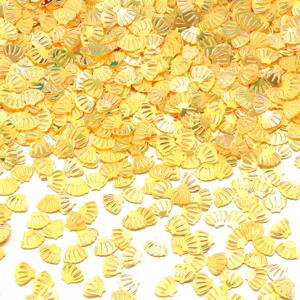 Paillettes a conchiglia dorate per nail art e fai da te. Decorazioni PVC lucide per vestiti.