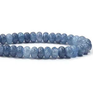Closeup detail of blue crackled glass abacus beads for DIY handmade jewelry accessories making.