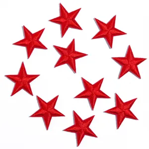 Red star embroidered patch detail view, fabric applique for clothing DIY decoration.