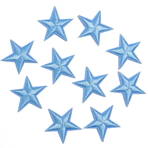 Blue embroidered star patches detail view showing clear texture and neat stitching work