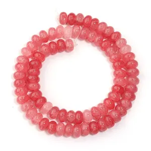 Red crackle glass abacus beads detail shot, ideal for DIY jewelry making and bracelets.