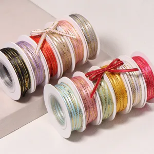 Gold edge polyester ribbon rolls for gift packaging, baking boxes, and DIY craft accessories.