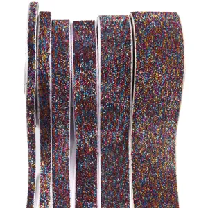 Close up of colorful glitter velvet ribbons showing sparkling textures in multiple widths.