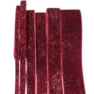 Red glitter velvet ribbon trim for DIY apparel, gift boxes, and party decorations detail.
