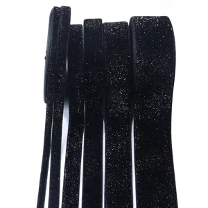 Black glitter velvet ribbon for DIY sewing, gift wrapping, and party decoration crafts.